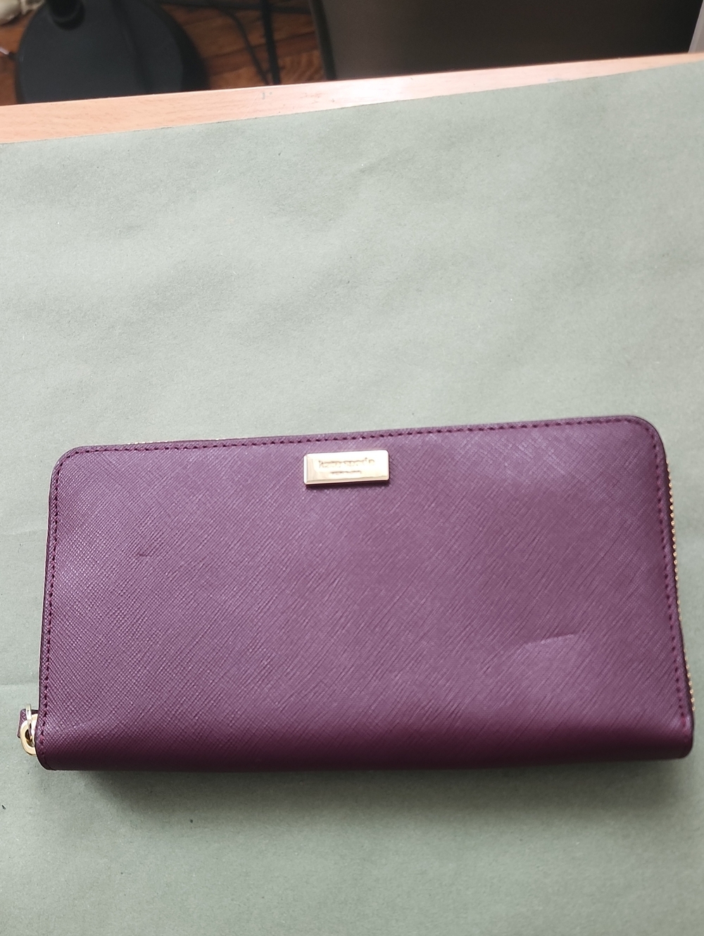 kate spade Plum Zip-Around Saffiano Wallet with Gold Plaque. New Without Tag